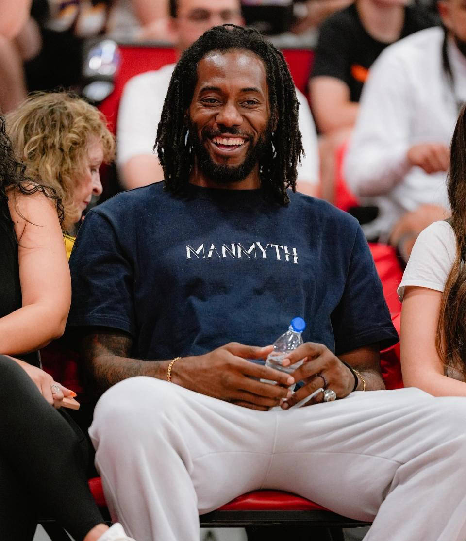 而是由主裁 而是由主裁